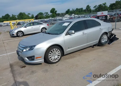2012 Ford Fusion Hybrid из США, поврежденный, VIN 3FADP0L31CR173930